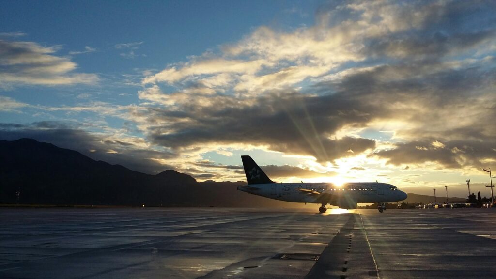 pexels-photo-730778-730778 A beautiful silhouette of an airplane on a runway during a vibrant sunset at Čilipi Airport, Croatia.